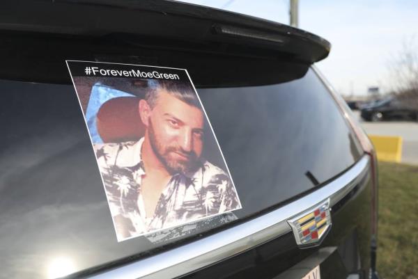 A photo of Mohammed al Hijoj on the back window of driver Omar Assaf’s vehicle in the Uber Black staging lot near O’Hare Internatio<em></em>nal Airport.